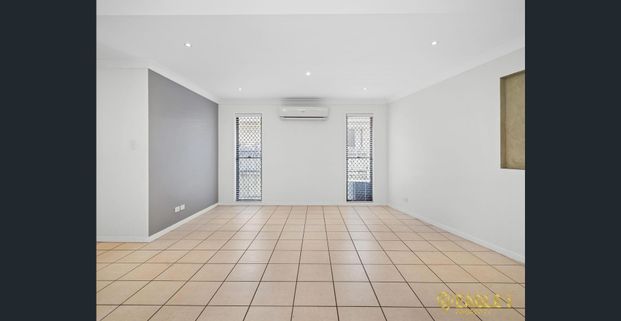 Stunning Family Home in Prime Springfield Lakes Location. Walk To the Train Station - Photo 1