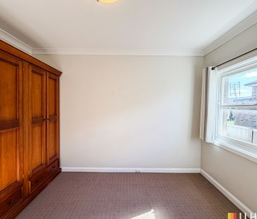 IDEALLY LOCATED FAMILY HOME - Photo 1