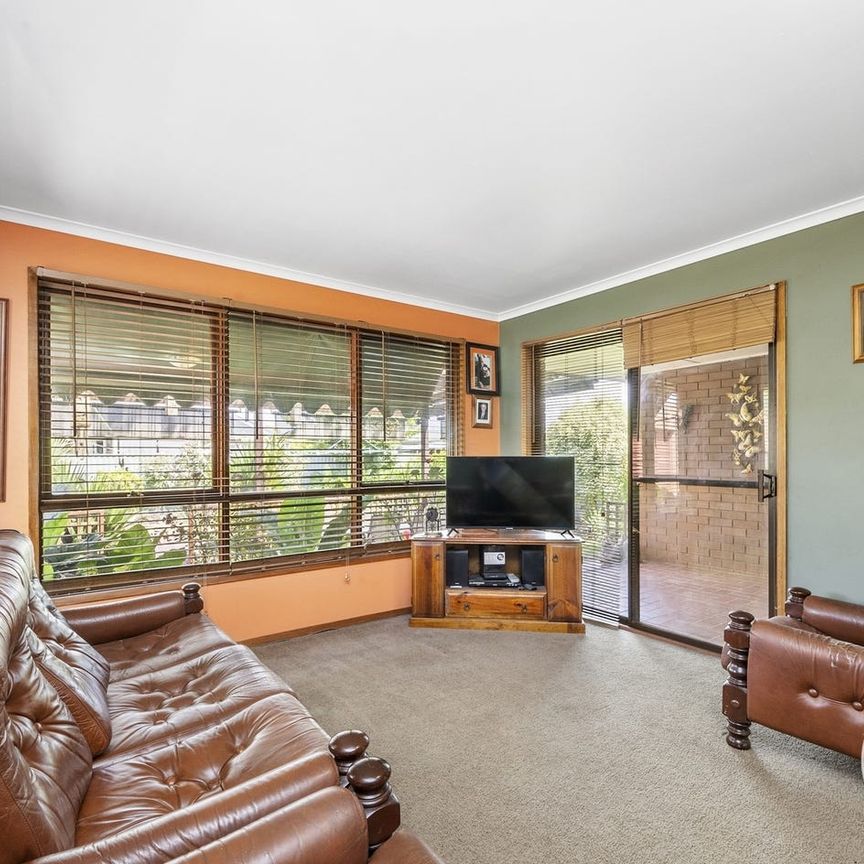 WELL KEPT FOUR BEDROOM HOME IN GREAT LOCATION - Photo 1