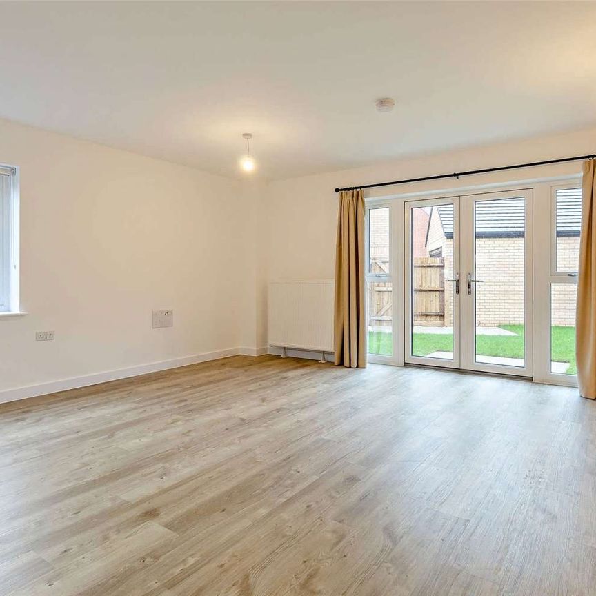 A four bedroom detached family home with a garage and garden - Photo 1