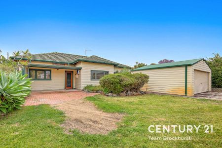 Charming 1950s Home with Modern Flexibility & Pristine Gardens! - Photo 4