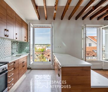 Duplex atypique en dernier étage - Photo 2
