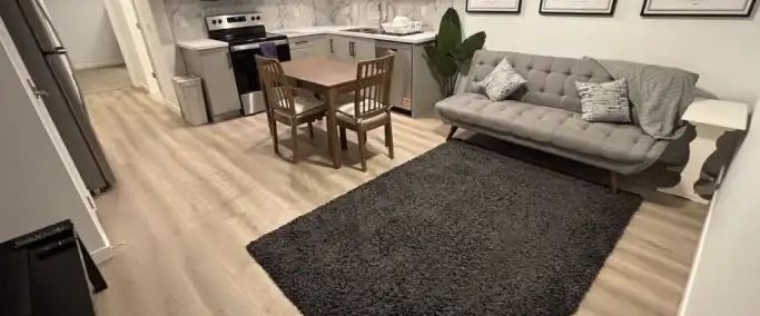 Fully furnished with high speed Internet 2 Bed 1 Bath Legal Bsmt Suite MAHOGANY | Calgary - Photo 1