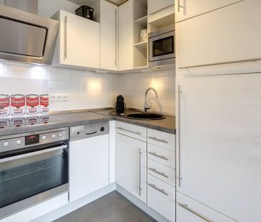 2-room apartment with designer furniture for rent - Photo 6