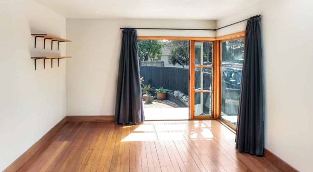 Three Bedroom Home in Great Location - Photo 1