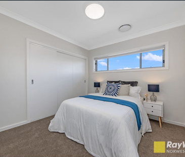 Modern 5-Bedroom Family Home in the Heart of Marsden Park - Photo 2