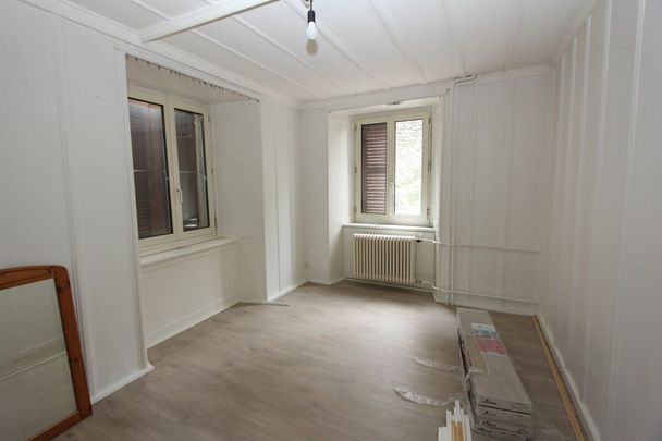 Appartement de 2.5 pièces au rez-de-chaussée - Photo 1