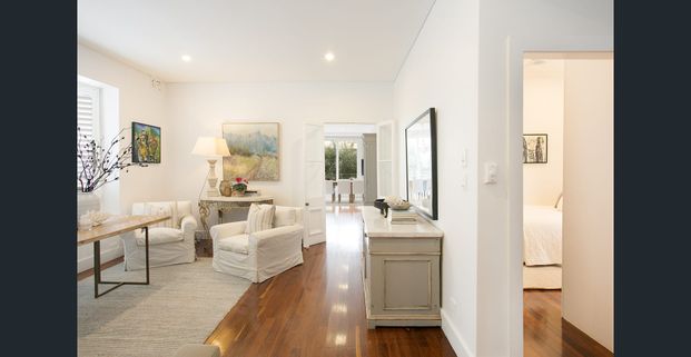 Sleek three-bedroom coastal retreat featuring rooftop entertaining, parking in the heart of Coogee - $3,000/week fully furnished inc bills - Photo 1