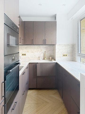 Location Appartement 4 pièces 105m² PARIS 16ème - Photo 4