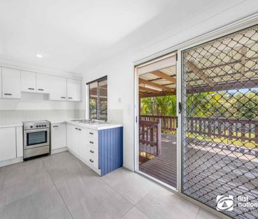 THREE BEDROOM FAMILY HOME IN BIRKDALE WITH A LARGE FULLY FENCED REA... - Photo 6