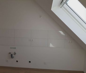 Moderne 2 Zimmer-Dachgeschosswohnung mit hochwertiger Einbauküche - Foto 6