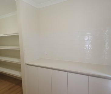 Spacious 4 x 2 Family Home with Study, Theatre & Quality Finishes - Photo 4