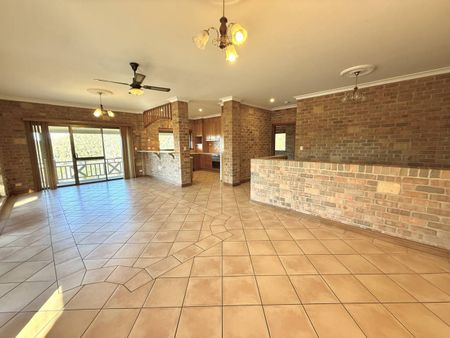 Spacious Family Home with Breathtaking Bushland Views and Flexible Living - Photo 2