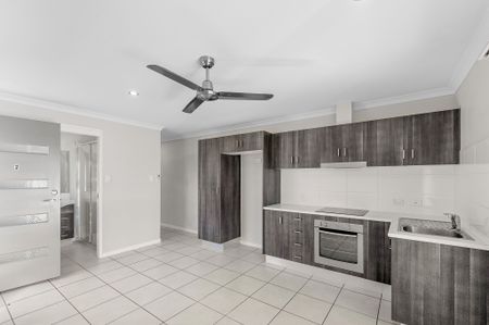 EASY LIVING ON HARMONY DRIVE - FRESH, BRIGHT, AND MOVE-IN READY AT A REDUCED PRICE! - Photo 5