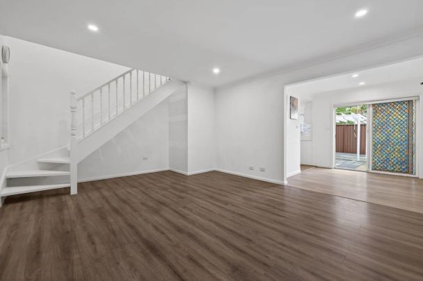 Light-Filled & Beautifully Updated Family Townhouse - Photo 1