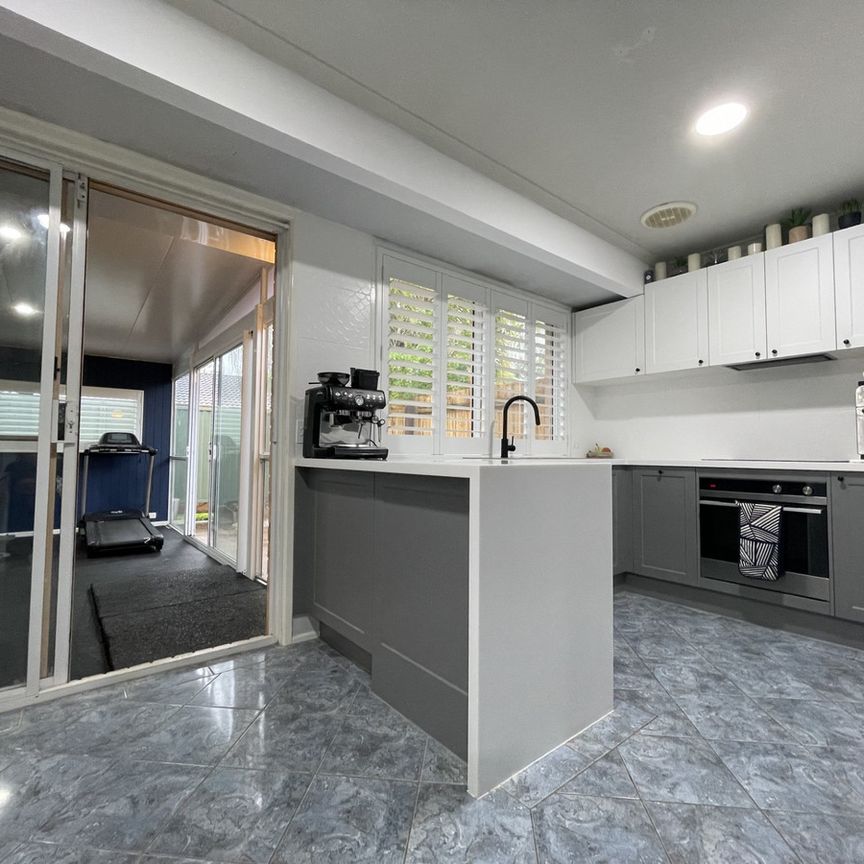 Modern 2-Bedroom Home with Extra Space & Prime Location! - Photo 1