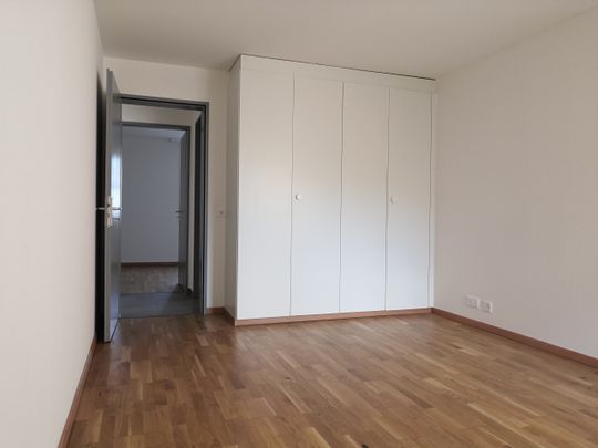 Spacieux 3,5 pièces avec terrasse privative et accès jardin en commun - Photo 1