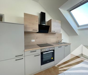 Gut aufgeteilte 2-Zimmer Dachgeschosswohnung in Alturfahr! - Photo 1