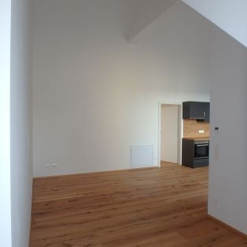 DACHGESCHOSSWOHNUNG MIT TERRASSE - Foto 1