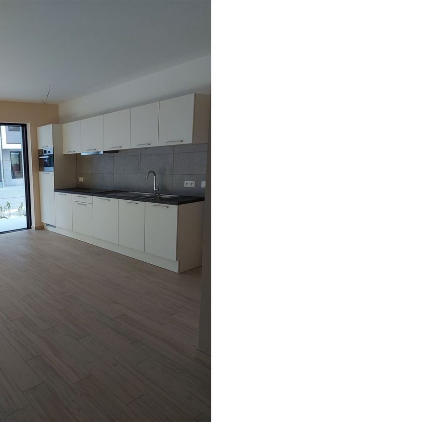 Gelijkvloers appartement met overdekte autostaanplaats en kelderberging - Foto 1