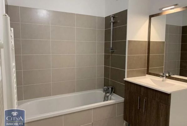 3 pièces de 59 m2 - Photo 1