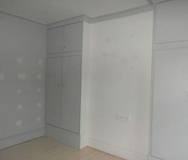 Three‑bed terraced home with modern kitchen, family bathroom and sp... - Photo 2