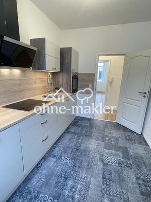 3-Raumwohnung mit EBK - Erstbezug nach Sanierung in ruhiger Seitenstraße - Photo 1