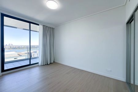 Luxury Apartment with Spectacular Water Views | Top Floor of Complex - Photo 5