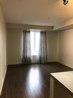 Venu Living at its finest – 1 bedroom plus den - Photo 1