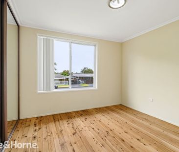 Spacious Family Home in Prime Macquarie Fields Location - Photo 6