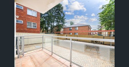 Bright and tidy two-bedroom brick unit with private balcony - Photo 5