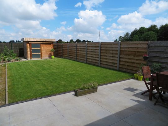 EENGEZINSWONING + tuin - Photo 1