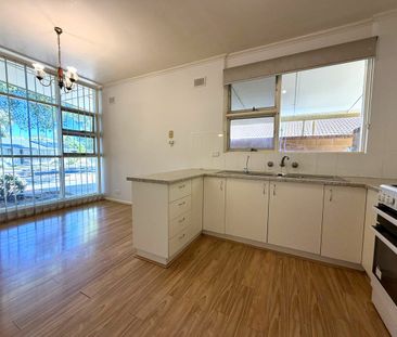 Spacious Family Home with Generous Yards in Prime Location! - Photo 5