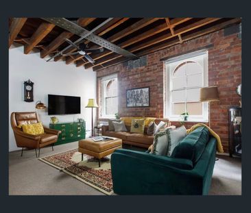 Fully Furnished Heritage Warehouse Apartment in Prime Yarra-Side Lo... - Photo 2