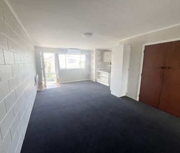 Step into comfort and convenience with this upstairs unit, freshly ... - Photo 3