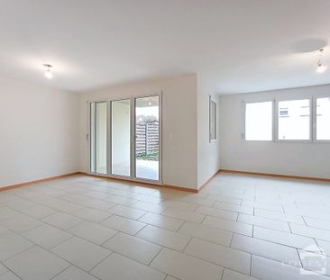 Bel appartement de 3,5 pièces au rez-de-chaussée avec terrasse - Photo 1