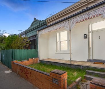 LARGE HOME RIGHT IN THE ACTION! - Photo 3