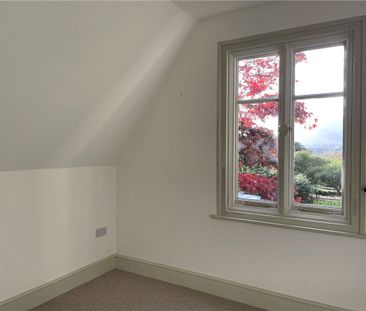 A sensitively modernised three bedroom cottage situated within a co... - Photo 3