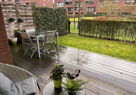 Gelijkvloers appartement met 1 slaapkamer, terras en tuintje - Photo 5