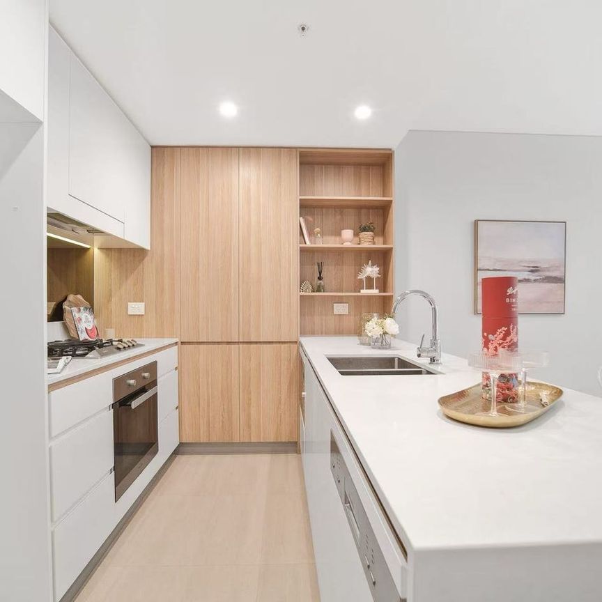 Wentworth Point | Sun-kissed 1 Bed · 1 Bath · 1 Parking Leafy outlook • Oversized balcony • Steps to Marina Square & Ferry - Photo 1