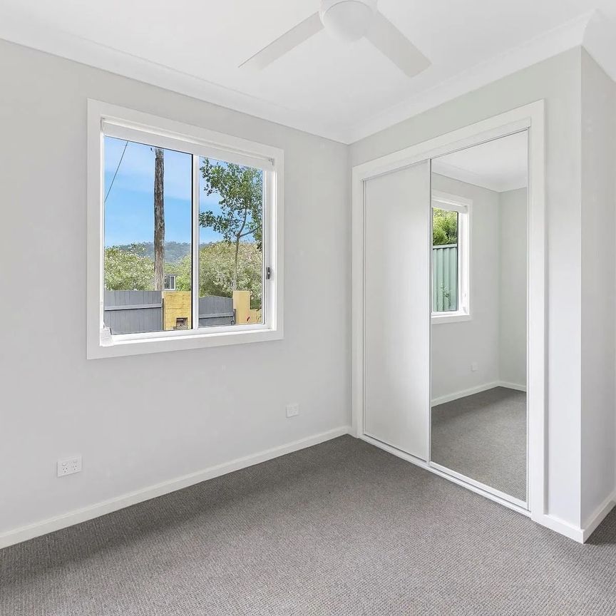 Quality Home with Private Deck & Secure Yard - Photo 1