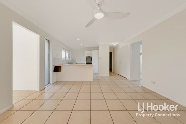 Low Set Three Bedroom Home In The Heart of Eatons Hill - Photo 1