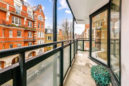 A light and modern three-bedroom, two-bathroom apartment on the second floor (with lift) of a modern development on Drayton Gardens SW10. - Photo 3