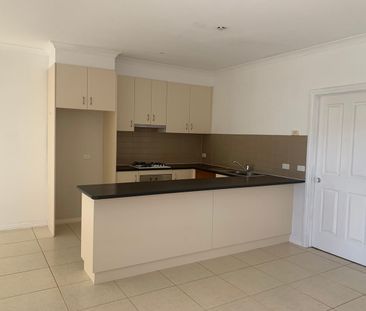 Stylish & Spacious Two-Bedroom Townhouse with Study and Garage - Photo 4