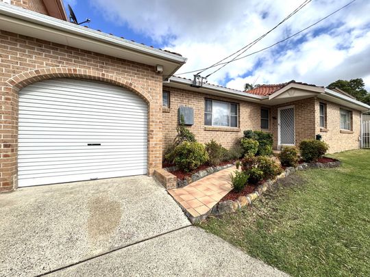 Freshly Painted Four Bedroom Home - Photo 1