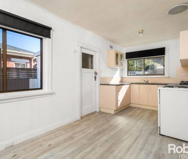 Two-bedroom home in sought after area - Photo 3