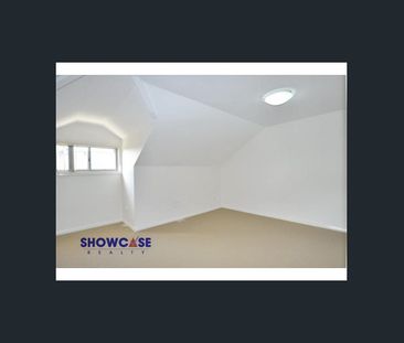 Ultra Convenient Location & Stylish Townhouse! - Photo 5