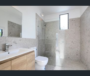 Freshly Renovated 3 Bedroom Unit with Cottage Charm - Photo 6
