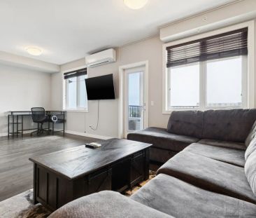 Essence at Windermere South Furnished Suite — 1 bedroom - Photo 1