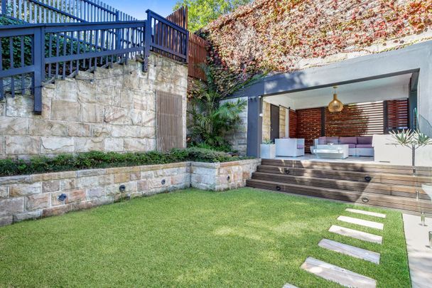 Sunlit family home with privacy and pool oasis - Photo 1